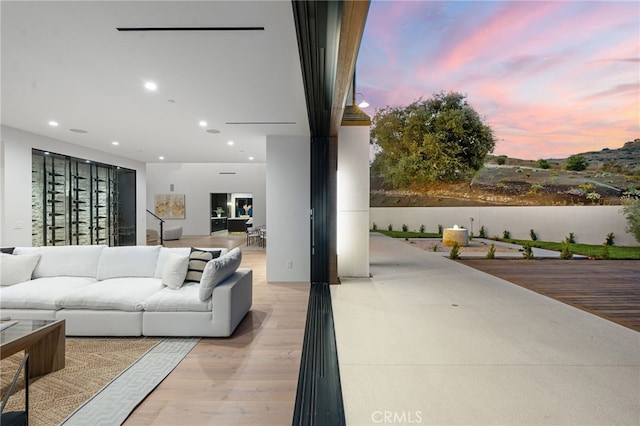 living room featuring wood finished floors and recessed lighting