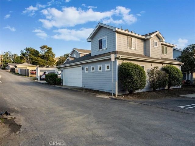 view of home's exterior featuring a garage