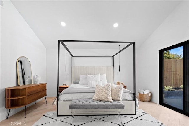 bedroom with lofted ceiling, access to exterior, light wood-style floors, and recessed lighting