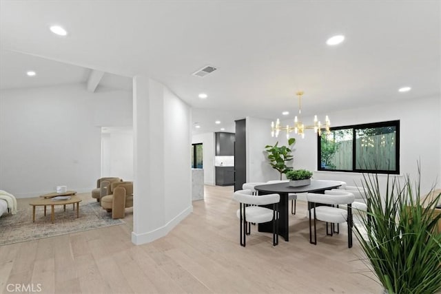 dining space with visible vents, lofted ceiling with beams, an inviting chandelier, light wood-style floors, and recessed lighting