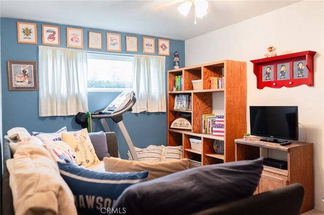 living room featuring ceiling fan