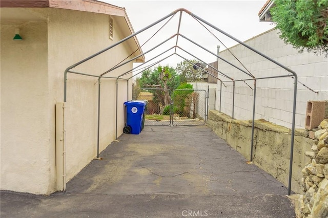 view of patio / terrace featuring fence