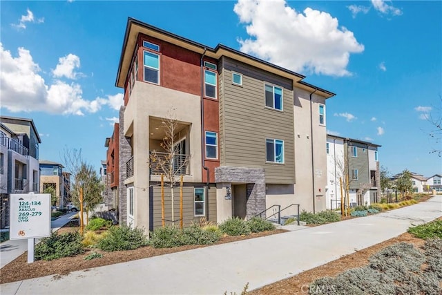 view of property with a residential view