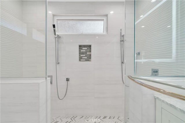 bathroom with a shower stall