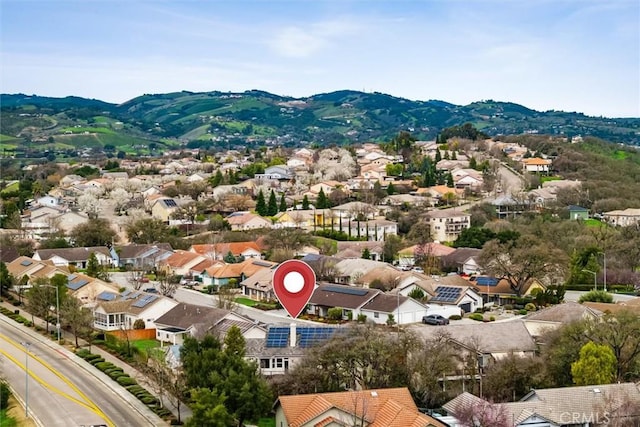 birds eye view of property featuring a residential view and a mountain view