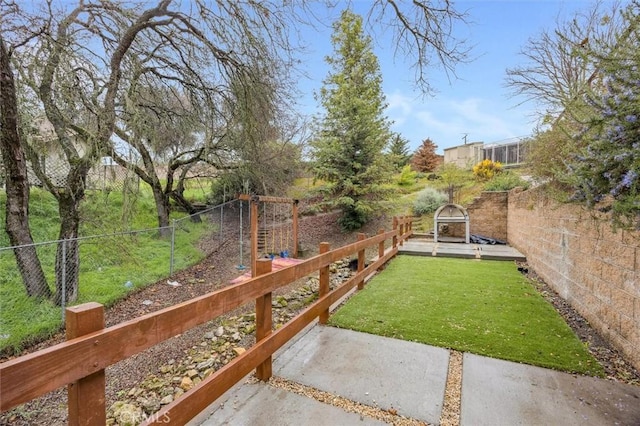 view of yard with a fenced backyard