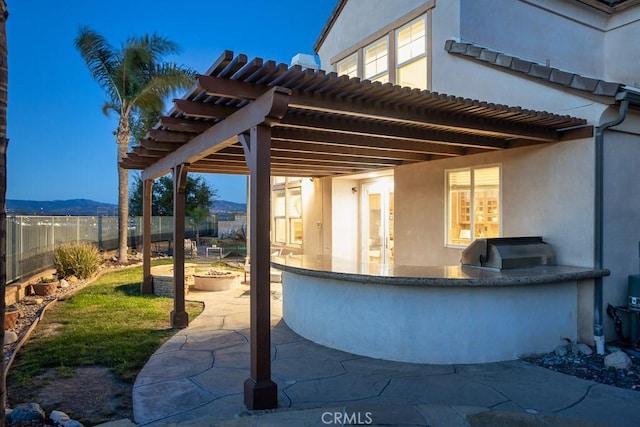 view of patio with a fenced backyard, grilling area, and area for grilling