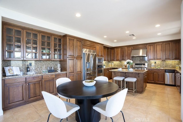25663 Elmwood Ln, Valencia, CA 91381 - dining room featuring light tile patterned floors, visible vents, and recessed lighting