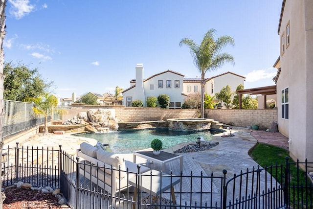 25663 Elmwood Ln, Valencia, CA 91381 - view of pool featuring a fenced backyard, a pool with connected hot tub, and a patio