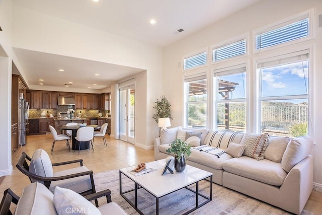 25663 Elmwood Ln, Valencia, CA 91381 - living area featuring recessed lighting, light tile patterned floors, visible vents, and baseboards