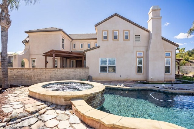 25663 Elmwood Ln, Valencia, CA 91381 - view of pool featuring a fenced in pool, fence, and an in ground hot tub
