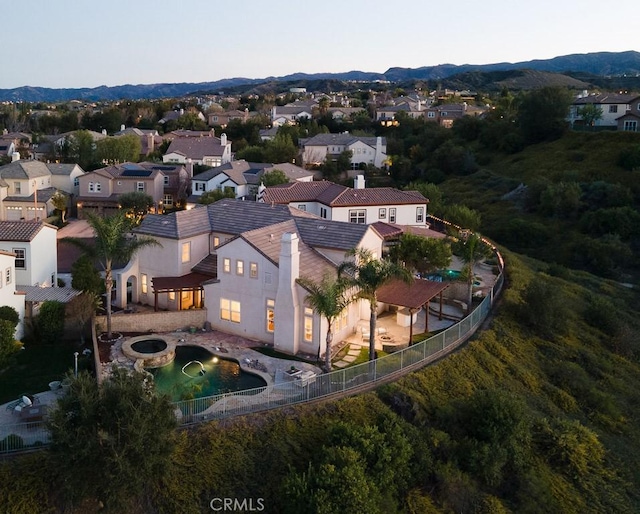 bird's eye view with a residential view and a mountain view