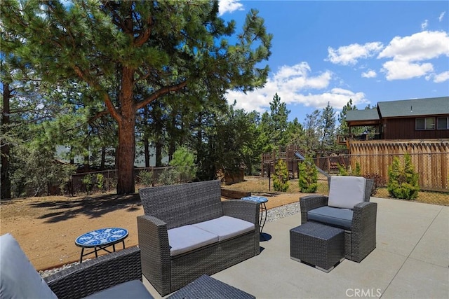 view of patio / terrace featuring a fenced backyard and an outdoor hangout area