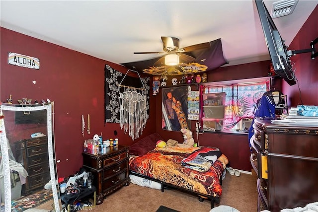 carpeted bedroom with ceiling fan