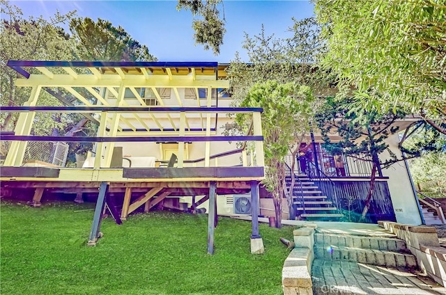 view of jungle gym featuring stairs and a lawn