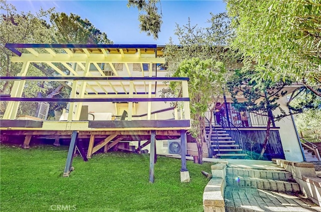 exterior space featuring a yard and stairway