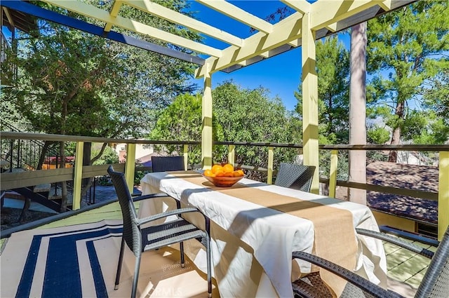 exterior space featuring a pergola and outdoor dining space