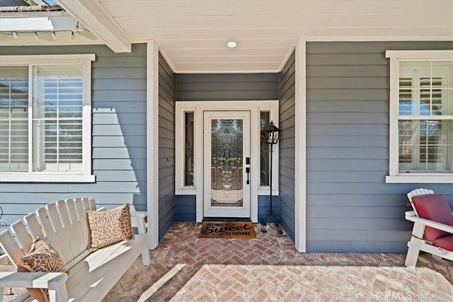 entrance to property with a porch