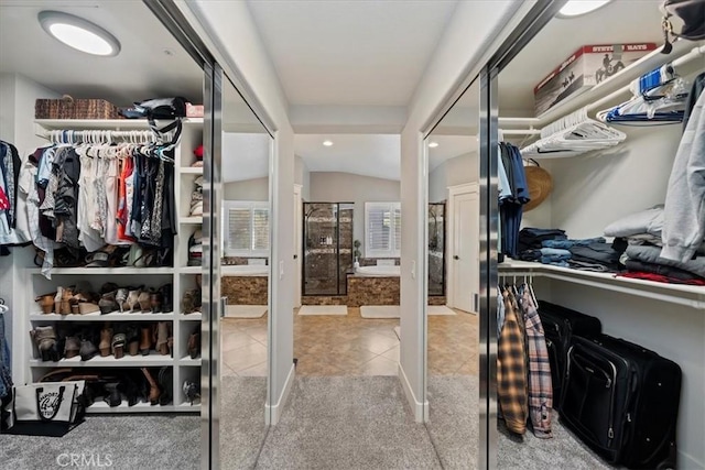 walk in closet with tile patterned floors