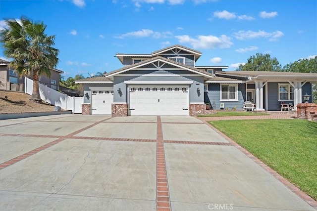 view of front facade featuring a garage, concrete driveway, fence, and a front lawn