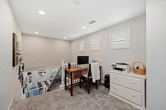 carpeted office space with visible vents and recessed lighting