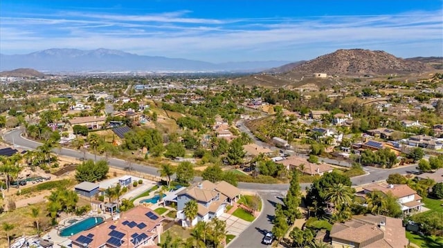 bird's eye view with a residential view and a mountain view