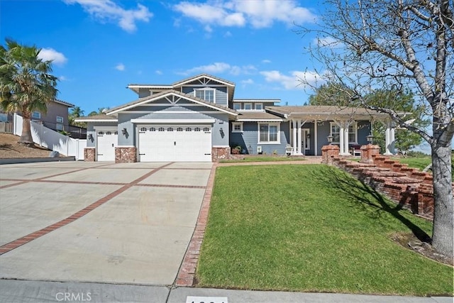 craftsman-style home with a garage, concrete driveway, a front yard, and fence