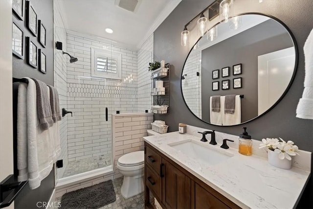 full bathroom featuring toilet, visible vents, vanity, tile patterned floors, and a stall shower