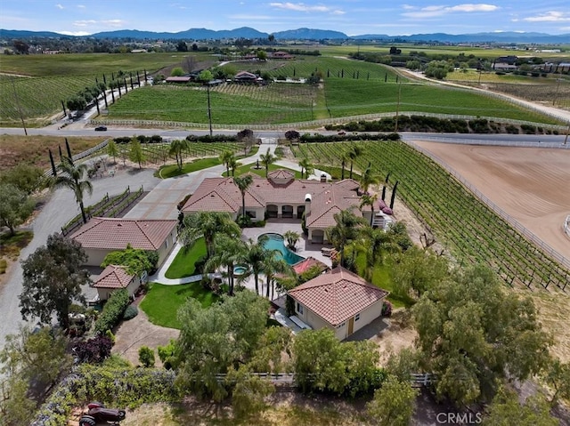 drone / aerial view with a rural view and a mountain view