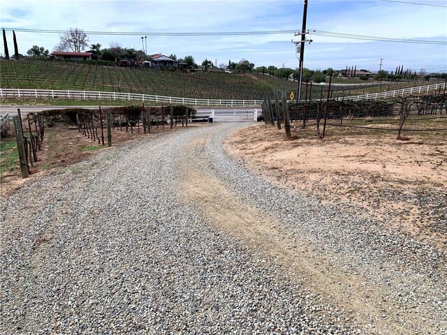 view of road featuring a rural view