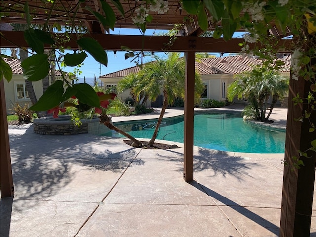 pool with a patio area