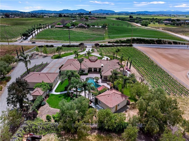 bird's eye view featuring a mountain view and a rural view