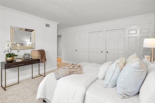 2851 Catalpa St, Newport Beach, CA 92660 - bedroom with baseboards, visible vents, ornamental molding, carpet floors, and multiple closets