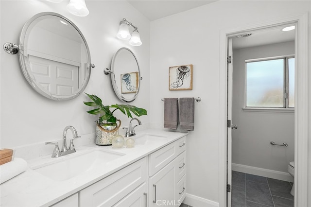 2851 Catalpa St, Newport Beach, CA 92660 - bathroom with double vanity, tile patterned flooring, a sink, and toilet