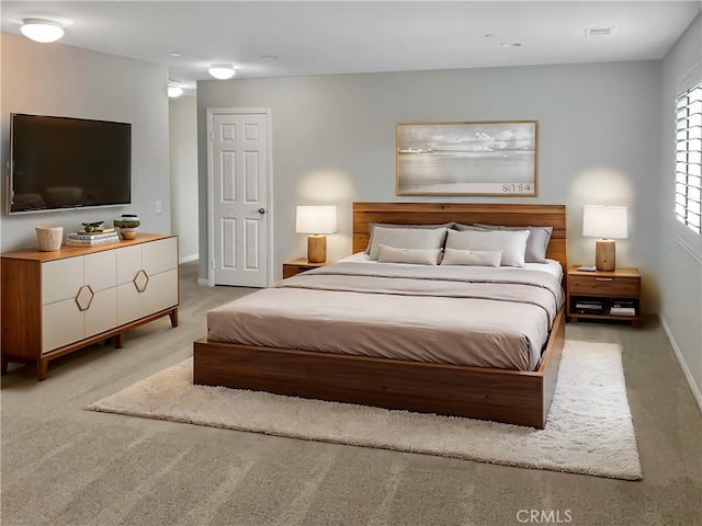 3434 Presidio Ln, Perris, CA 92570 - bedroom featuring baseboards, visible vents, and light carpet