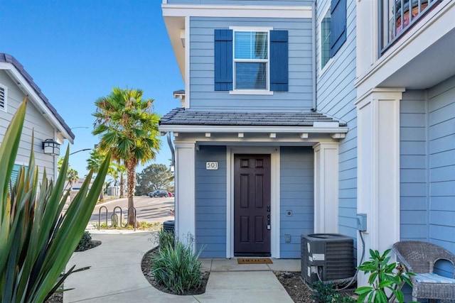 doorway to property with central AC