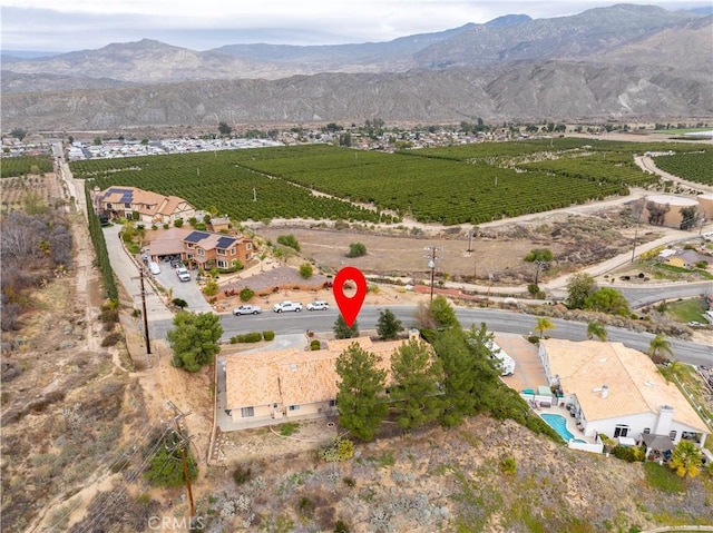 bird's eye view with a mountain view and a rural view