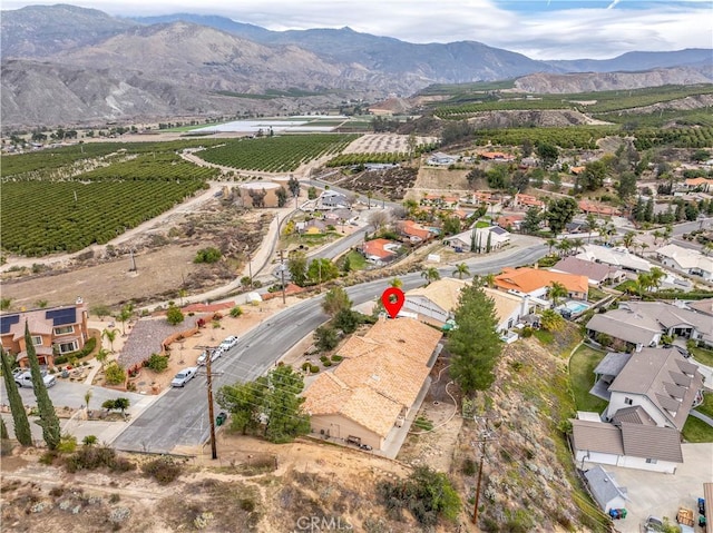 aerial view featuring a rural view and a mountain view