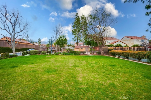 view of yard with fence