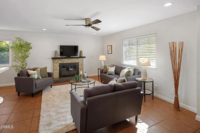 living room with plenty of natural light, tile patterned flooring, and recessed lighting