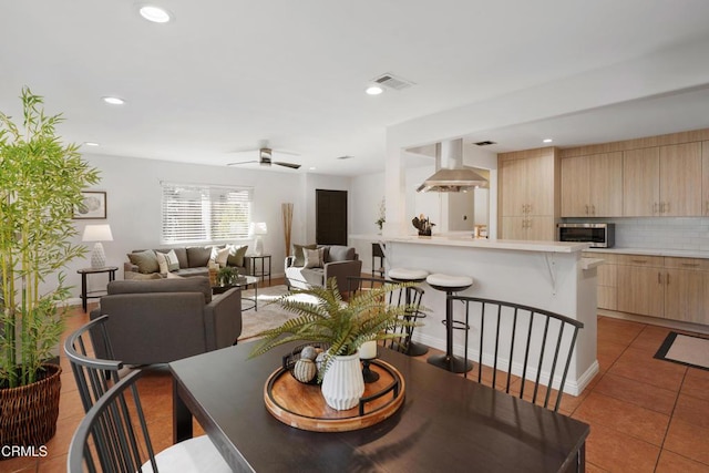 dining area with ceiling fan, light tile patterned flooring, recessed lighting, visible vents, and baseboards