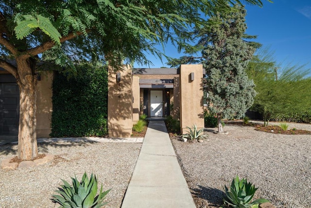 exterior space featuring stucco siding