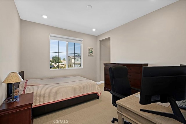 bedroom with carpet and recessed lighting