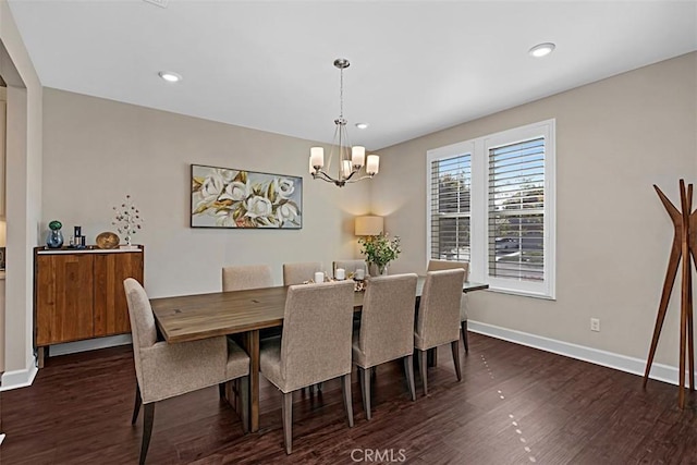 dining room with baseboards, dark wood-style flooring, recessed lighting, and a notable chandelier