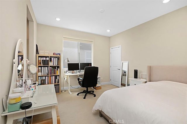 bedroom with recessed lighting, baseboards, and light colored carpet