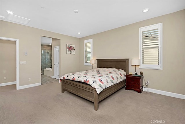 carpeted bedroom featuring recessed lighting, connected bathroom, and baseboards