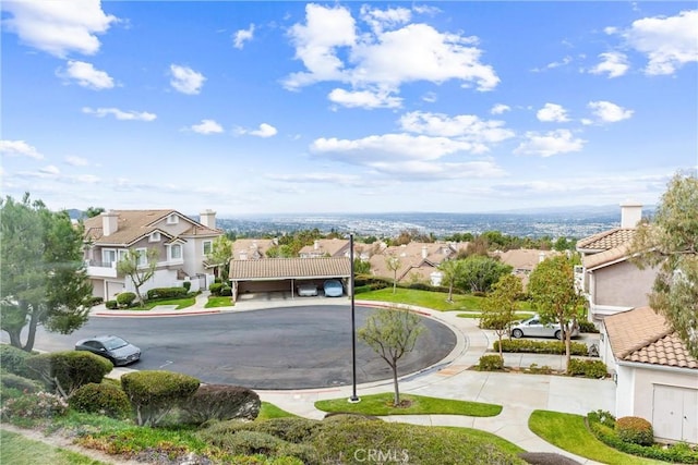 view of street with a residential view and sidewalks