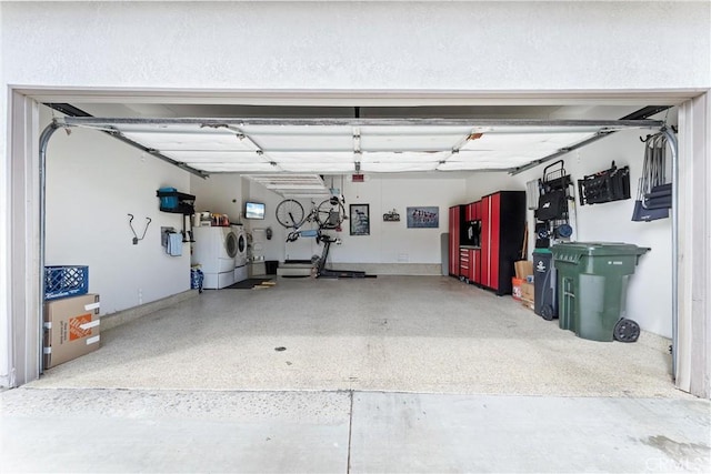 garage featuring independent washer and dryer