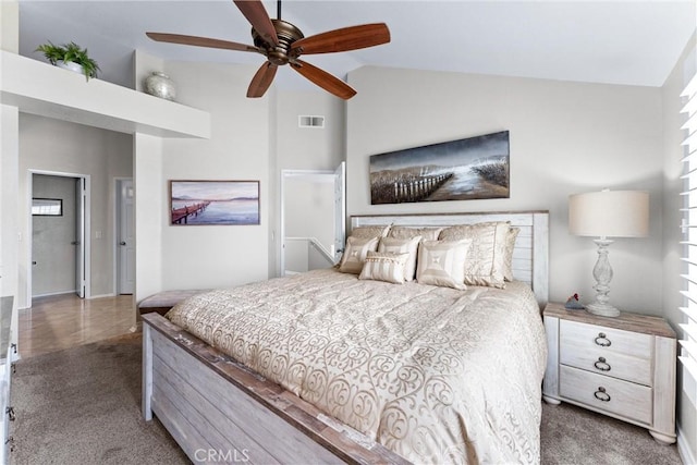 bedroom with high vaulted ceiling, carpet, visible vents, and ceiling fan