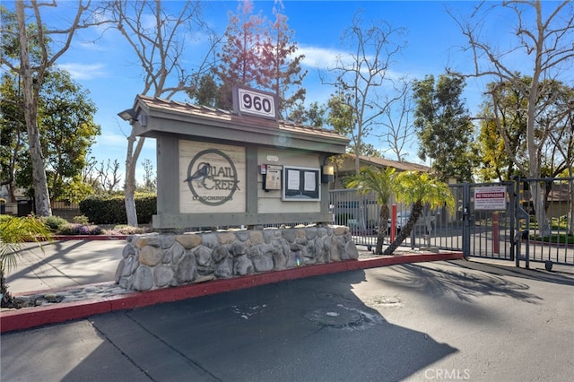 exterior space with a gate and fence